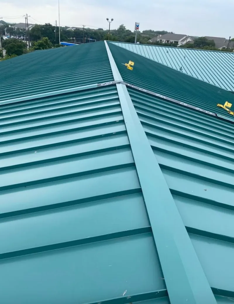 Green commercial metal roof ridge and valley for Metal Roof Repair in Salem