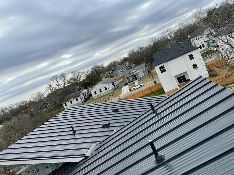 Standing seam metal roof panels with vents for Skylight Repair in Salem